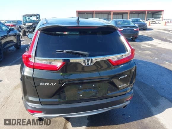 ✅ 2018 Honda CR-V Touring • VIN: 7FARW2H90JE052921 • Lot: 43671364. Listed on IAAI with 101,261 mi. Free auction sales archive from the USA and detailed vehicle history report at DreamBid. Image 15.