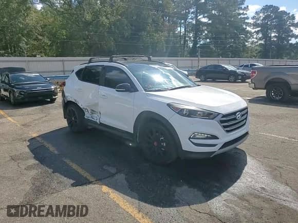 2017 Hyundai Tucson Sport z VIN KM8J33A24HU557040, wystawiony jako Copart lot #85887885 z przebiegiem 113 488 mil mil oraz Szkoda całkowita • Salvage title. Historia ofert i sprzedaży dostępna na DreamBid. Obrazek 14.