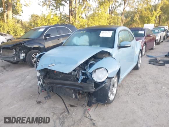 ✅ 2013 Volkswagen Beetle 2.5L • VIN: 3VWJP7AT9DM676805 • Lot: 43329631. Listed on IAAI with 115,000 mi. Free auction sales archive from the USA and detailed vehicle history report at DreamBid. Image 2.