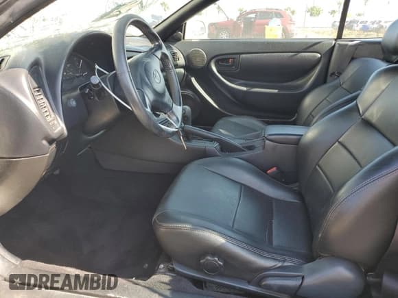 ✅ 1999 Toyota Celica GT • VIN: JT5FG02TXX0057048 • Lot: 92063245. Wystawiony na Copart z przebiegiem 154 668 mil. Bezpłatny archiwum sprzedaży aukcyjnych z USA i szczegółowy raport historii pojazdu na DreamBid. Zdjęcie 7.