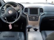 ✅ 2015 Jeep Grand Cherokee Summit • VIN: 1C4RJEJG0FC118974 • Lot: 49002165. Listed on Copart with 112,463 mi. Free auction sales archive from the USA and detailed vehicle history report at DreamBid. Image 8.