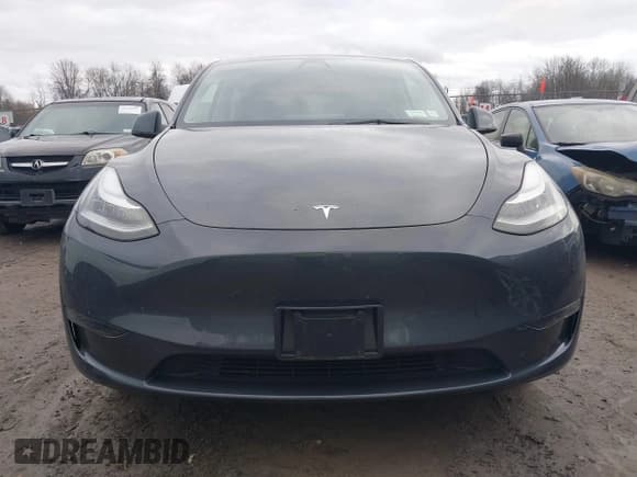 ✅ 2023 Tesla Model Y Long Range • VIN: 7SAYGDEE1PA067194 • Lot: 43689576. Listed on IAAI with 18,136 mi. Free auction sales archive from the USA and detailed vehicle history report at DreamBid. Image 12.
