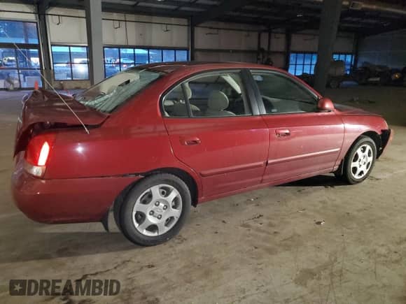 2002 Hyundai Elantra GLS z VIN KMHDN45D72U460530, wystawiony jako Copart lot #81283554 z przebiegiem 125 827 mil mil oraz Szkoda całkowita • Salvage title. Historia ofert i sprzedaży dostępna na DreamBid. Obrazek 3.