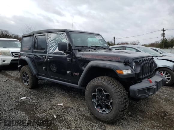 ✅ 2023 Jeep Wrangler Rubicon • VIN: 1C4HJXFG8PW653101 • Lot: 47422165. Listed on Copart with 13,532 mi. Free auction sales archive from the USA and detailed vehicle history report at DreamBid. Image 4.