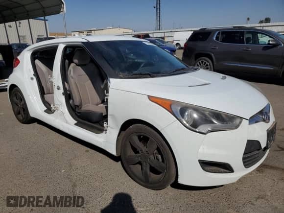 2014 Hyundai Veloster с VIN KMHTC6AD1EU215147, выставлен на аукционе Copart как лот 73018944 с пробегом 108 433 миль миль и Списание • Salvage title. История ставок и продаж доступна на DreamBid. Изображение 4.