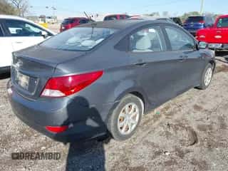 2012 Hyundai Accent GLS z VIN KMHCT4AE1CU196920, wystawiony jako IAAI lot #43477431 z przebiegiem 162 458 mil mil oraz . Historia ofert i sprzedaży dostępna na DreamBid. Obrazek 4.