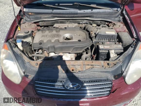 2006 Hyundai Accent GL z VIN KMHCN45C26U052459, wystawiony jako Copart lot #84417075 z przebiegiem 247 312 mil mil oraz Szkoda całkowita • Salvage title. Historia ofert i sprzedaży dostępna na DreamBid. Obrazek 11.