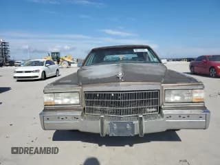 ✅ 1990 Cadillac Brougham • VIN: 1G6DW5476LR727151 • Лот: 88145665. Опубликован ранее на Copart с пробегом Не указан. Бесплатный доступ к архиву аукционных продаж из США и подробный отчёт об истории автомобиля на DreamBid. Изображение 5.