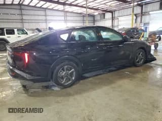 ✅ 2025 Kia K4 LXS • VIN: 3KPFT4DE4SE072067 • Лот: 92823495. Опубликован ранее на Copart с пробегом 16 807 миль. Бесплатный доступ к архиву аукционных продаж из США и подробный отчёт об истории автомобиля на DreamBid. Изображение 3.