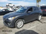 ✅ 2014 Mazda CX-5 Grand Touring • VIN: JM3KE4DY3E0353428 • Lot: 89551725. Listed on Copart with 203,511 mi. Free auction sales archive from the USA and detailed vehicle history report at DreamBid. Image 1.