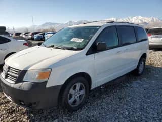 2010 Dodge Grand Caravan SE with VIN 2D4RN4DE7AR318343, listed as a Copart auction lot 42519525 with 220,189 mi miles and Salvage title. Bid and sale history available at DreamBid. Image 1.