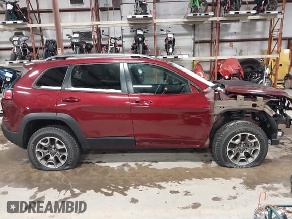 ✅ 2020 Jeep Cherokee Trailhawk • VIN: 1C4PJMBX2LD613814 • Lot: 41253162. Listed on IAAI with 55,002 mi. Free auction sales archive from the USA and detailed vehicle history report at DreamBid. Image 14.