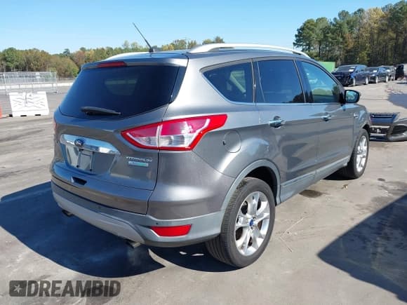 ✅ 2014 Ford Escape Titanium • VIN: 1FMCU0J92EUE55006 • Lot: 43559574. Wystawiony na IAAI z przebiegiem 98 269 mil. Bezpłatny archiwum sprzedaży aukcyjnych z USA i szczegółowy raport historii pojazdu na DreamBid. Zdjęcie 4.