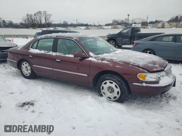 ✅ 2002 Lincoln Continental • VIN: 1LNHM97V62Y684873 • Лот: 87602665. Опубликован ранее на Copart с пробегом 52 974 миль. Бесплатный доступ к архиву аукционных продаж из США и подробный отчёт об истории автомобиля на DreamBid. Изображение 4.