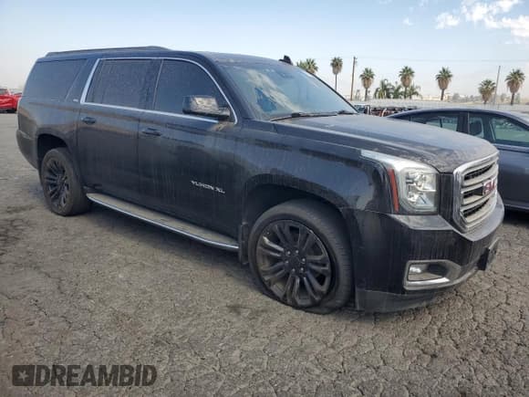 ✅ 2020 GMC Yukon XL SLT • VIN: 1GKS2GKC9LR206022 • Lot: 62706505. Listed on Copart with 165,837 mi. Free auction sales archive from the USA and detailed vehicle history report at DreamBid. Image 4.