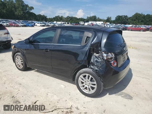 2015 Chevrolet Sonic LT z VIN 1G1JC6SB0F4211786, wystawiony jako Copart lot #65592775 z przebiegiem 97 042 mil mil oraz Nie do naprawy • Non repairable. Historia ofert i sprzedaży dostępna na DreamBid. Obrazek 2.