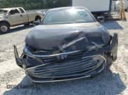 ✅ 2021 Toyota Avalon XLE • VIN: 4T1AZ1FB7MU060098 • Lot: 66777555. Wystawiony na Copart z przebiegiem 33 242 mil. Bezpłatny archiwum sprzedaży aukcyjnych z USA i szczegółowy raport historii pojazdu na DreamBid. Zdjęcie 5.