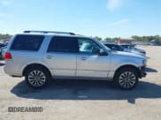 ✅ 2015 Lincoln Navigator • VIN: 5LMJJ2HTXFEJ09131 • Lot: 41807356. Wystawiony na IAAI z przebiegiem 106 680 mil. Bezpłatny archiwum sprzedaży aukcyjnych z USA i szczegółowy raport historii pojazdu na DreamBid. Zdjęcie 14.
