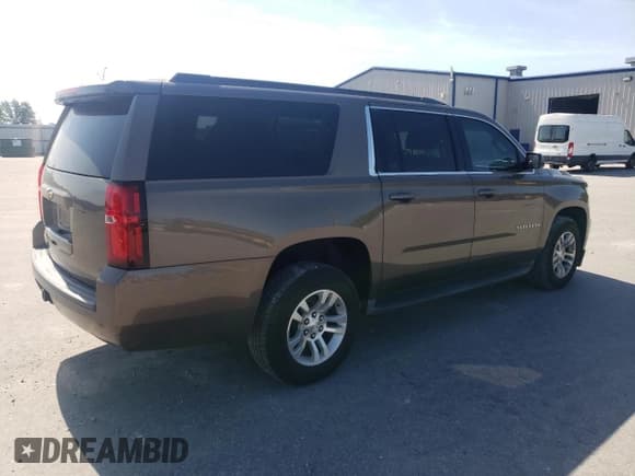 ✅ 2015 Chevrolet Suburban LS • VIN: 1GNSCHEC2FR682392 • Lot: 54833925. Listed on Copart with 156,667 mi. Free auction sales archive from the USA and detailed vehicle history report at DreamBid. Image 3.