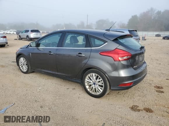 ✅ 2016 Ford Focus Titanium • VIN: 1FADP3N20GL249535 • Лот: 93452785. Опубликован ранее на Copart с пробегом 57 259 миль. Бесплатный доступ к архиву аукционных продаж из США и подробный отчёт об истории автомобиля на DreamBid. Изображение 2.