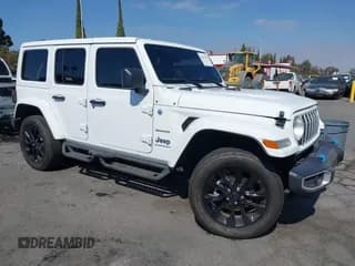✅ 2024 Jeep Wrangler Sahara • VIN: 1C4RJXP62RW255492 • Lot: 43407205. Listed on IAAI with 15,649 mi. Free auction sales archive from the USA and detailed vehicle history report at DreamBid. Image 1.