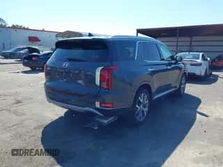 2022 Hyundai Palisade Limited z VIN KM8R54HE1NU405988, wystawiony jako IAAI lot #43269990 z przebiegiem 51 201 mil mil oraz . Historia ofert i sprzedaży dostępna na DreamBid. Obrazek 4.