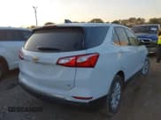 ✅ 2020 Chevrolet Equinox LT • VIN: 2GNAXJEV0L6164006 • Lot: 43519260. Listed on IAAI with 60,174 mi. Free auction sales archive from the USA and detailed vehicle history report at DreamBid. Image 4.