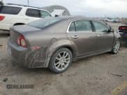 ✅ 2012 Chevrolet Malibu LTZ • VIN: 1G1ZE5EU7CF157570 • Lot: 82427004. Listed on Copart with 152,932 mi. Free auction sales archive from the USA and detailed vehicle history report at DreamBid. Image 3.