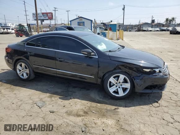 ✅ 2014 Volkswagen CC Sport • VIN: WVWBP7AN4EE536936 • Лот: 69149875. Опубликован ранее на Copart с пробегом 158 808 миль. Бесплатный доступ к архиву аукционных продаж из США и подробный отчёт об истории автомобиля на DreamBid. Изображение 4.