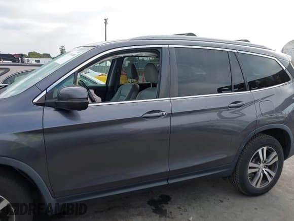✅ 2018 Honda Pilot EX-L • VIN: 5FNYF6H57JB014338 • Lot: 43791400. Listed on IAAI with 70,924 mi. Free auction sales archive from the USA and detailed vehicle history report at DreamBid. Image 15.