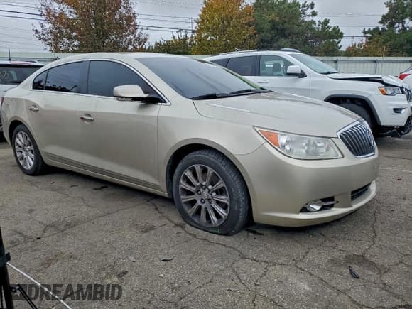 ✅ 2013 Buick LaCrosse Leather • VIN: 1G4GC5E34DF230936 • Lot: 93876255. Listed on Copart with 143,590 mi. Free auction sales archive from the USA and detailed vehicle history report at DreamBid. Image 4.