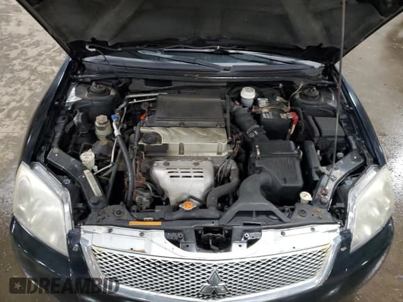 ✅ 2012 Mitsubishi Galant FE • VIN: 4A32B2FF0CE006749 • Lot: 56602695. Listed on Copart with 184,605 mi. Free auction sales archive from the USA and detailed vehicle history report at DreamBid. Image 11.