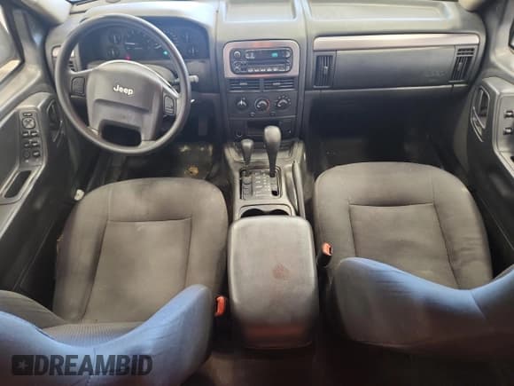 ✅ 2004 Jeep Grand Cherokee Laredo • VIN: 1J4GW48S64C341072 • Лот: 84983565. Опубликован ранее на Copart с пробегом 187 666 миль. Бесплатный доступ к архиву аукционных продаж из США и подробный отчёт об истории автомобиля на DreamBid. Изображение 8.