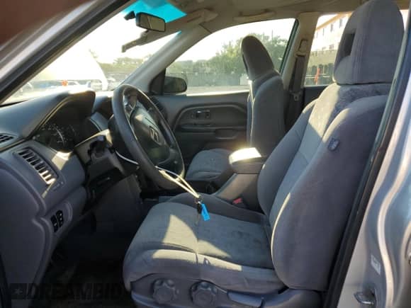 2004 Honda Pilot LX with VIN 2HKYF18104H543202, listed as a Copart auction lot 69050395 with 205,083 mi miles and Salvage title. Bid and sale history available at DreamBid. Image 7.