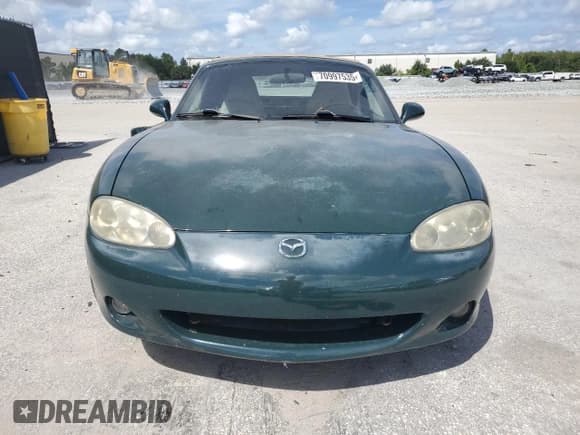 ✅ 2001 Mazda MX-5 Miata • VIN: JM1NB353610213198 • Lot: 70997535. Wystawiony na Copart z przebiegiem 129 156 mil. Bezpłatny archiwum sprzedaży aukcyjnych z USA i szczegółowy raport historii pojazdu na DreamBid. Zdjęcie 5.