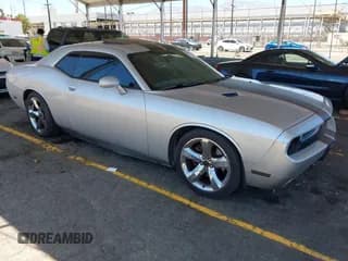 ✅ 2012 Dodge Challenger R/T • VIN: 2C3CDYBT6CH107999 • Lot: 42837530. Wystawiony na IAAI z przebiegiem 124 448 mil. Bezpłatny archiwum sprzedaży aukcyjnych z USA i szczegółowy raport historii pojazdu na DreamBid. Zdjęcie 1.