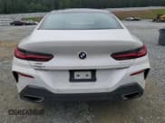 ✅ 2022 BMW 8 Series 840i • VIN: WBAGV4C03NCH43079 • Лот: 59799665. Опубликован ранее на Copart с пробегом 28 069 миль. Бесплатный доступ к архиву аукционных продаж из США и подробный отчёт об истории автомобиля на DreamBid. Изображение 6.