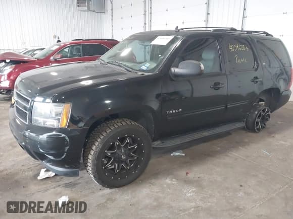 ✅ 2014 Chevrolet Tahoe LT • VIN: 1GNSCBE07ER249202 • Lot: 42546283. Listed on IAAI with 124,538 mi. Free auction sales archive from the USA and detailed vehicle history report at DreamBid. Image 18.