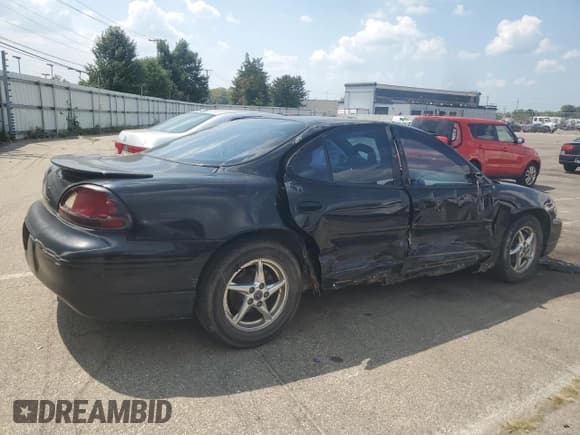 ✅ 2002 Pontiac Grand Prix GT • VIN: 1G2WP52K82F138021 • Lot: 64775974. Wystawiony na Copart z przebiegiem 208 762 mil. Bezpłatny archiwum sprzedaży aukcyjnych z USA i szczegółowy raport historii pojazdu na DreamBid. Zdjęcie 3.
