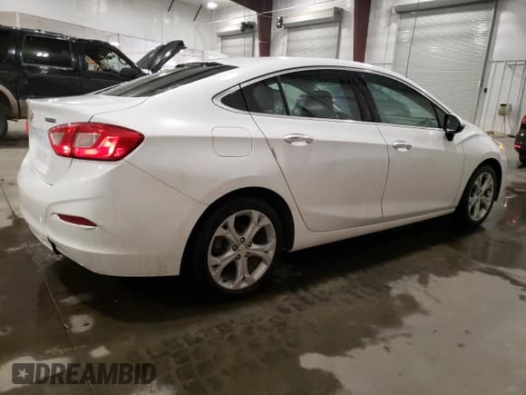 ✅ 2018 Chevrolet Cruze Premier • VIN: 1G1BF5SM1J7169224 • Lot: 42573743. Listed on Copart with 151,067 mi. Free auction sales archive from the USA and detailed vehicle history report at DreamBid. Image 3.