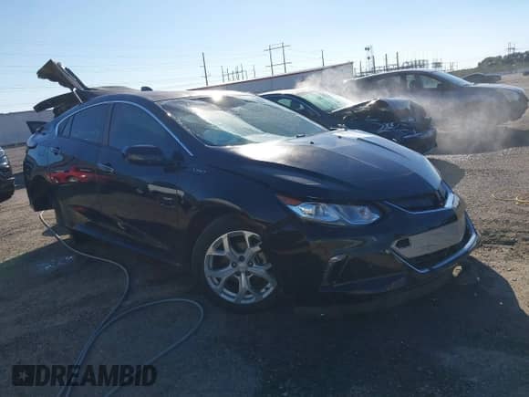 2017 Chevrolet Volt Premier z VIN 1G1RB6S5XHU203648, wystawiony jako IAAI lot #43468353 z przebiegiem Nie podano mil oraz . Historia ofert i sprzedaży dostępna na DreamBid. Obrazek 1.