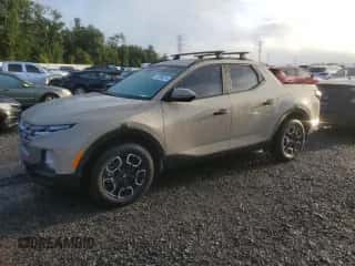 2023 Hyundai Santa Cruz SEL z VIN 5NTJC4AEXPH053557, wystawiony jako Copart lot #70206074 z przebiegiem Nie podano mil oraz Nie do naprawy • Non repairable. Historia ofert i sprzedaży dostępna na DreamBid. Obrazek 1.