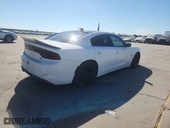 ✅ 2015 Dodge Charger RT • VIN: 2C3CDXCT2FH916140 • Lot: 91899525. Listed on Copart with 119,106 mi. Free auction sales archive from the USA and detailed vehicle history report at DreamBid. Image 3.