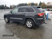 ✅ 2011 Jeep Grand Cherokee Laredo • VIN: 1J4RR4GG9BC705592 • Lot: 93147795. Listed on Copart with 221,481 mi. Free auction sales archive from the USA and detailed vehicle history report at DreamBid. Image 2.