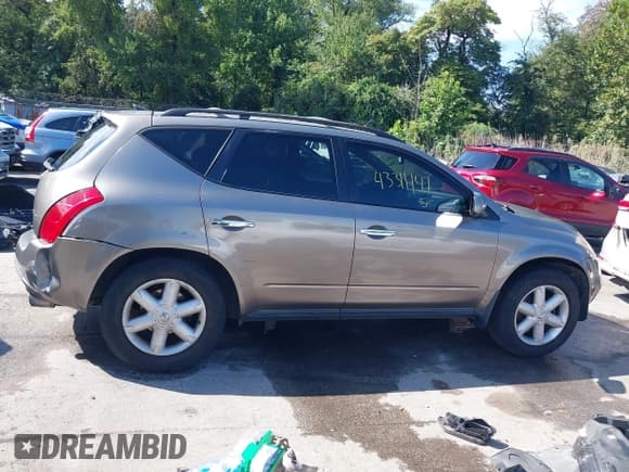 ✅ 2004 Nissan Murano SE • VIN: JN8AZ08W24W335285 • Lot: 43311141. Wystawiony na IAAI z przebiegiem 128 597 mil. Bezpłatny archiwum sprzedaży aukcyjnych z USA i szczegółowy raport historii pojazdu na DreamBid. Zdjęcie 13.