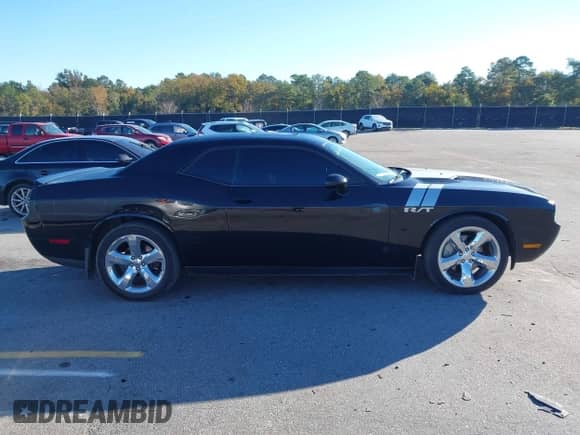 2012 Dodge Challenger R/T Plus with VIN 2C3CDYBT9CH275359, listed as a IAAI auction lot 43595746 with 182,928 mi miles and . Bid and sale history available at DreamBid. Image 13.