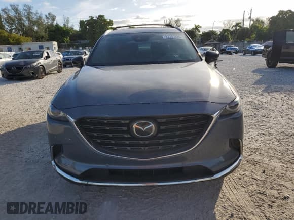 ✅ 2021 Mazda CX-9 Grand Touring • VIN: JM3TCADY1M0525902 • Lot: 92303935. Wystawiony na Copart z przebiegiem 68 873 mil. Bezpłatny archiwum sprzedaży aukcyjnych z USA i szczegółowy raport historii pojazdu na DreamBid. Zdjęcie 5.