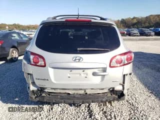 ✅ 2012 Hyundai Santa Fe SE • VIN: 5XYZHDAG2CG145428 • Lot: 81672604. Listed on Copart with 89,987 mi. Free auction sales archive from the USA and detailed vehicle history report at DreamBid. Image 6.