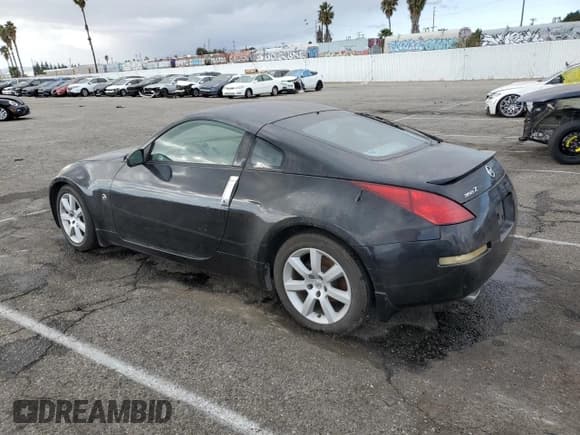 ✅ 2005 Nissan 350Z • VIN: JN1AZ34D65M601151 • Лот: 80855494. Опубликован ранее на Copart с пробегом Не указан. Бесплатный доступ к архиву аукционных продаж из США и подробный отчёт об истории автомобиля на DreamBid. Изображение 2.