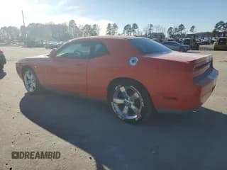 ✅ 2009 Dodge Challenger R/T • VIN: 2B3LJ54T59H511449 • Lot: 88753985. Wystawiony na Copart z przebiegiem 100 297 mil. Bezpłatny archiwum sprzedaży aukcyjnych z USA i szczegółowy raport historii pojazdu na DreamBid. Zdjęcie 2.